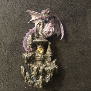 Purple dragon on castle statue